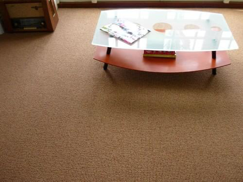 Carpet with table on top